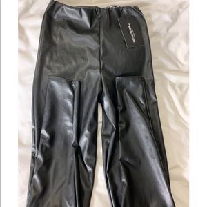 High wasted leather pants. Runs as a size 2